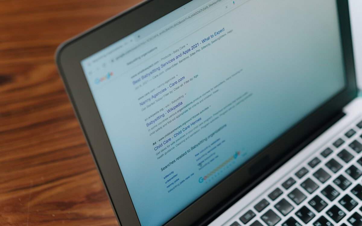 Open laptop showing a search on the screen